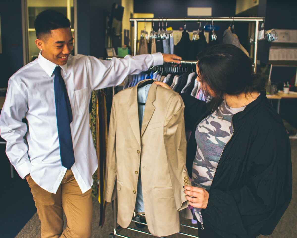 Kaiser helping student pick out interview outfit