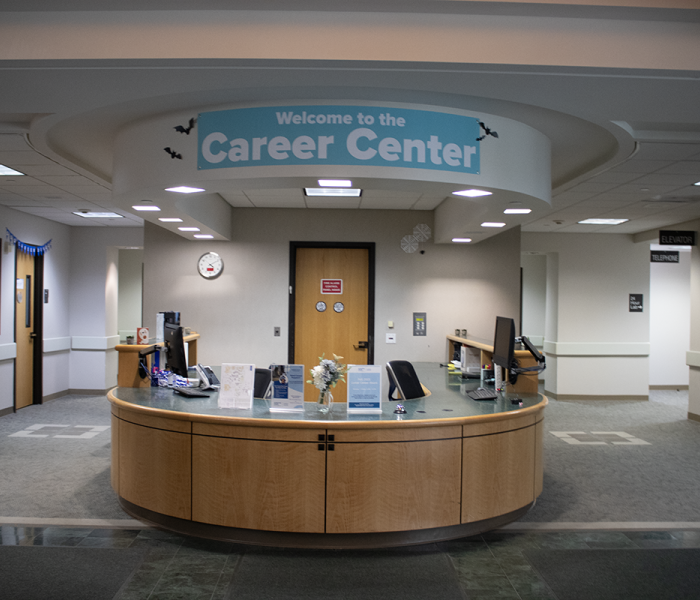 a rounded counter with the sign career center over it