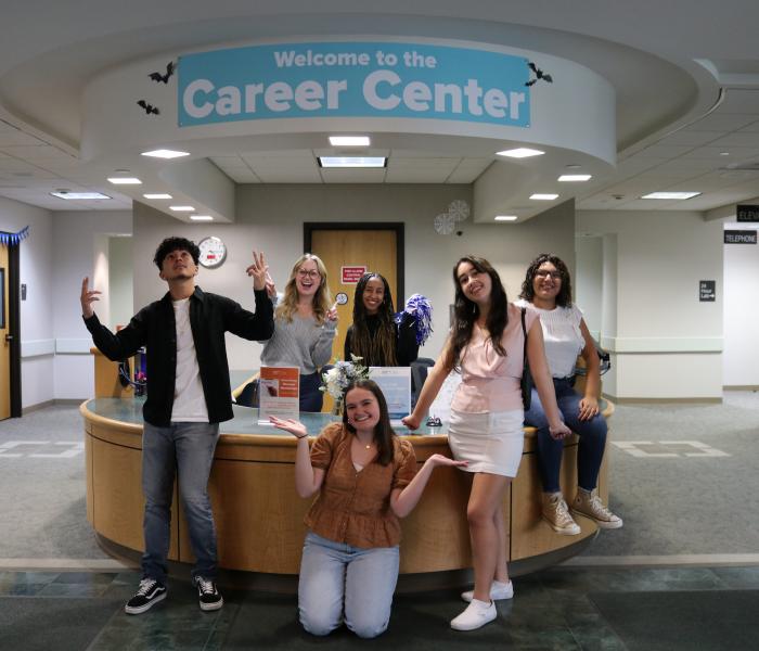 students at the career center desk