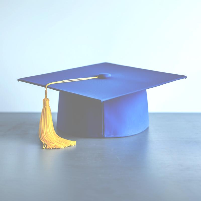 a graduate cap on a table