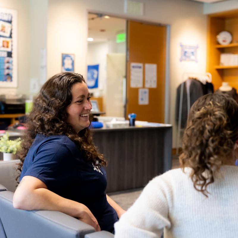 Advisor talking with Student
